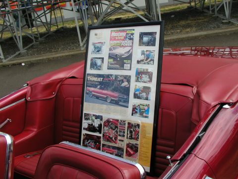 1967 Ford Ranchero - Display board car magazine covers and photos, placed inside a red convertible.