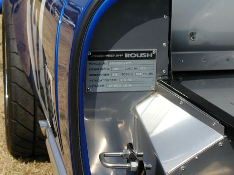 1967 Ford Ranchero - A close-up view of a vehicle's identification plate, detailing its performance specifications and installation history.