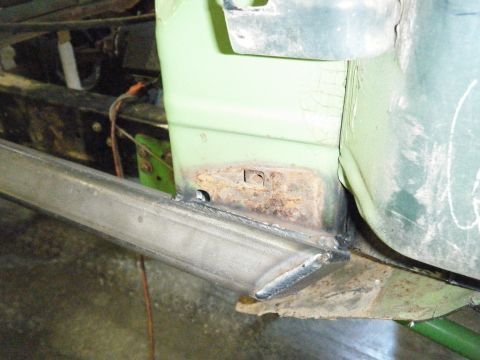 1978 Ford Bronco - Detail of rust and welding work on a vehicle's lower body panel, with visible Supermotors.net watermark.