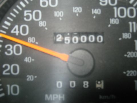1997 Ford Crown Victoria - Odometer displays 250,000 miles, indicating high mileage for the vehicle.