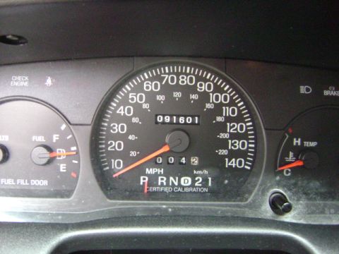 2001 Ford Crown Victoria - The dashboard gauges display mileage and fuel levels, but no specific year is visually confirmed.