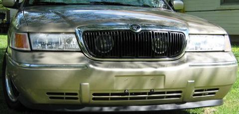 2000 Mercury Grand Marquis - Front view of a 2000 Mercury Grand Marquis, showing the grille and headlights.