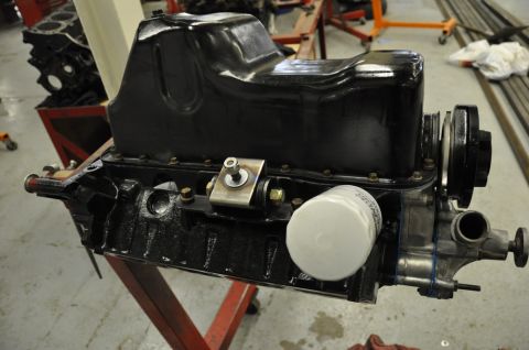 1996 Ford Bronco - Engine block assembly with oil pan and filter, likely for a rebuild or repair project.