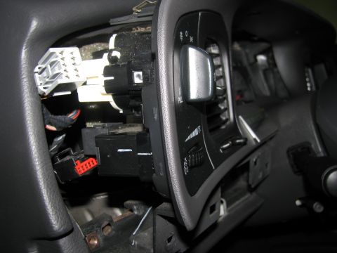 2003 Mercury Marauder - Disconnecting the headlamp and dimmer harnesses. Be sure to disconnect the battery or the headlamps with illuminate.