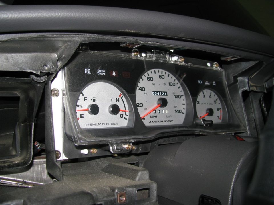 Mercury Marauder instrument cluster removed showing speedometer odometer 054121