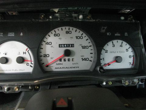 2003 Mercury Marauder - Close-up of the instrument cluster gauges, including the speedometer, tachometer, and fuel gauge.