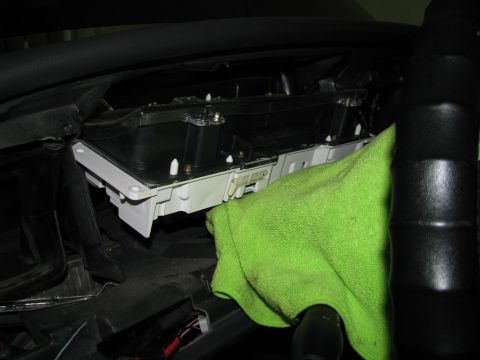 2003 Mercury Marauder - Removal of the gauge cluster. Place a towel over the steering column to prevent scratching or marring. Two harnesses must be diconnected fr…