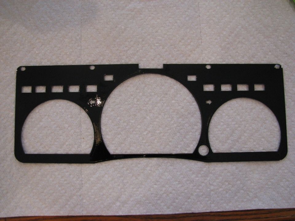 The custom guage cluster trim panel, painted the same OEM black as the Marauder's exterior.