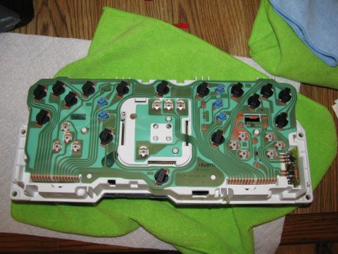2003 Mercury Marauder - Circuit board for a car's dashboard, showing the rear electronic components and wiring connections.