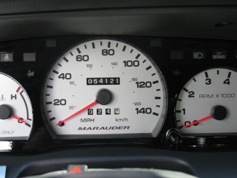 2003 Mercury Marauder - The gauge cluster displays the word MARAUDER, but no year is visible.