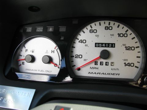 2003 Mercury Marauder - The gauge cluster for a 2003 Mercury Marauder shows the speedometer, odometer, and fuel/temperature readings.