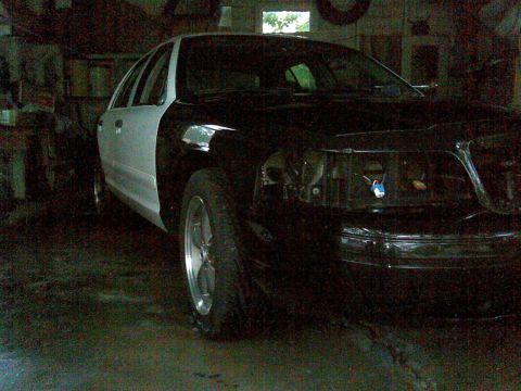 2003 Ford Crown Victoria - exterior and jambs stripped, car washed, garage cleared and hosed out