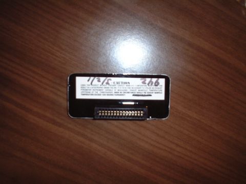 2000 Ford Excursion - This is an electronic chip with a caution label, not a 2000 Ford Excursion.
