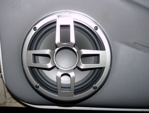 2006 Ford E350 - Installed my MB Quart FSA 216 6.5" components in the doors. Tweeters mounted in map pocket, and crossover below the arm rest.