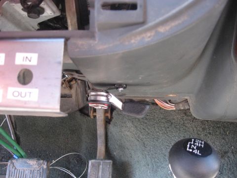 1990 Ford F-250 - Interior view of a 1990 Ford F-250, highlighting the 4x4 shifter and auxiliary input/output switches.