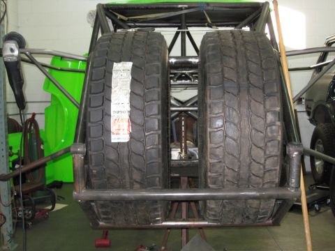 1995 Ford Bronco - Spare tires are mounted on a custom frame, ready for off-road use.