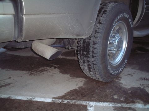 2000 Ford Excursion - Tiny stock exhaust.