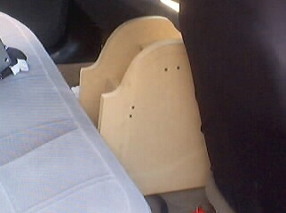 1999 Ford Taurus - A custom wooden center console modification is visible inside a vehicle's interior.