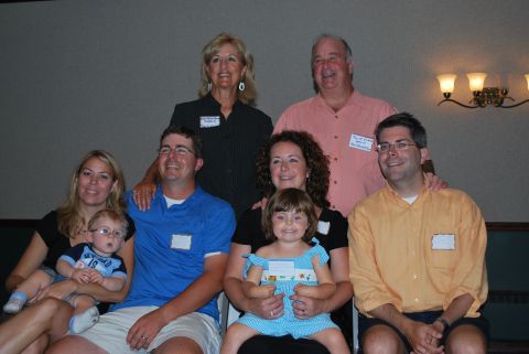 1996 Ford Bronco - A family poses for a group photo at an indoor event.
