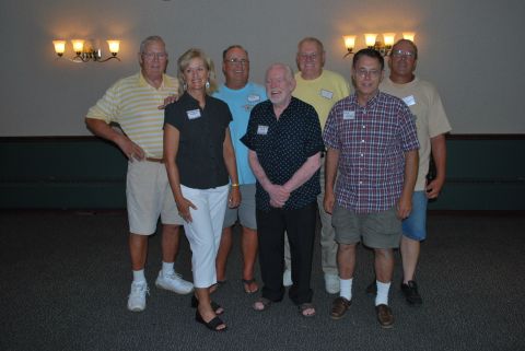 1996 Ford Bronco - A group of individuals, likely at a reunion, pose for a photo with several wearing name tags.