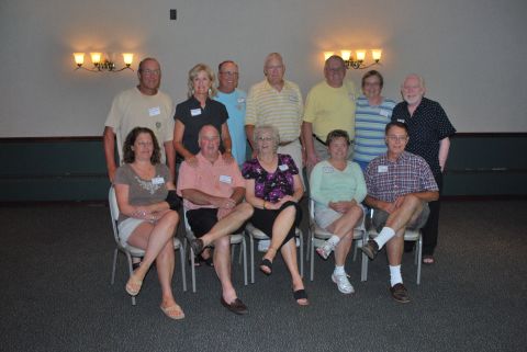 1996 Ford Bronco - Eleven adults are gathered for a photo, some seated and some standing.