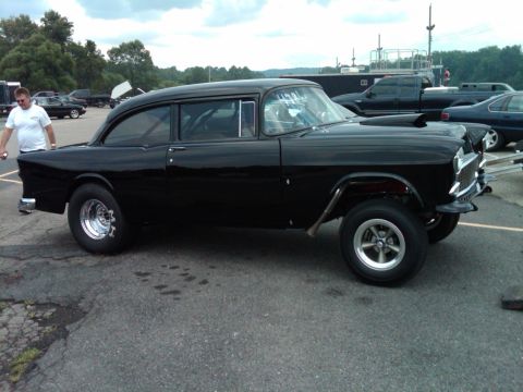 1955 Chevrolet Bel Air - Modified 1955 Chevrolet Bel Air drag car parked at an outdoor event.