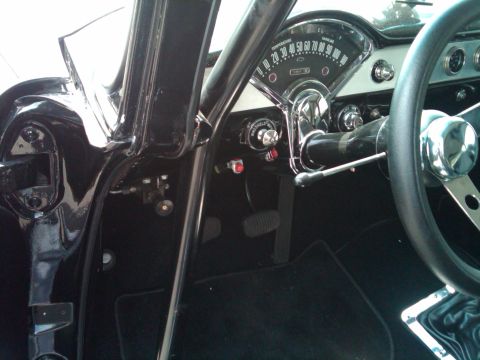 1955 Chevrolet Bel Air - Interior view of a 1955 Chevrolet Bel Air, highlighting the dashboard and steering wheel.