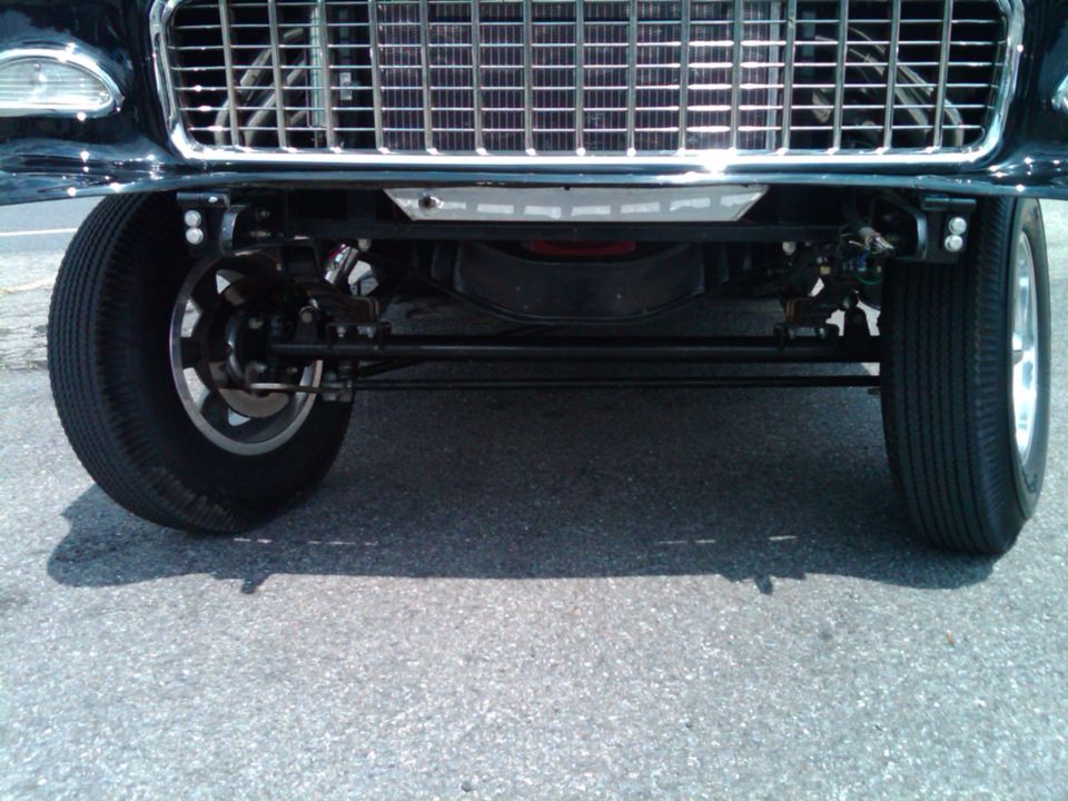 Front view of a 1955 Chevrolet Bel Air showing the grille and front suspension