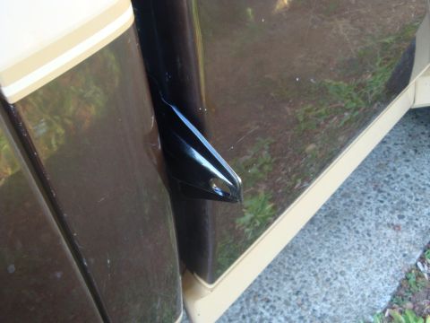 1988 Ford F-350 - Close-up of a truck's side panel, showing the door handle and trim.