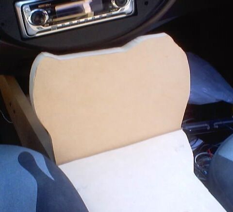 1999 Ford Taurus - Custom console panel installed in the interior of a 1999 Ford Taurus, an aftermarket stereo system.