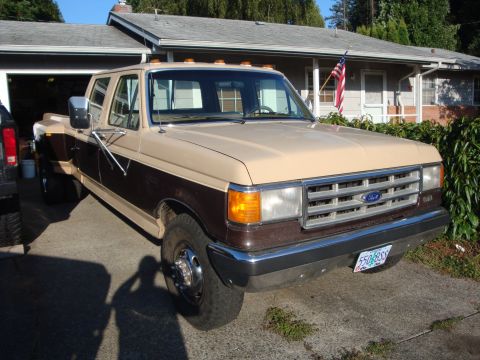 1988 Ford F-350 - This Ford F-Series truck has a two-tone paint scheme and dual rear wheels.