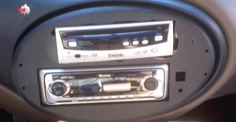 1999 Ford Taurus - The dashboard shows two aftermarket car stereos installed in a custom dash kit.