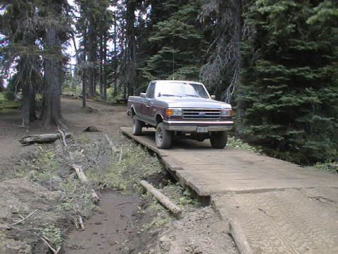 1989 Ford F-150 - Crossing the bridge at entrance of the trail to Funny Rocks & Moon Rocks play areas.
