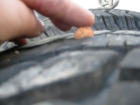 penny in tire tread