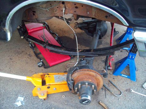 1989 Ford F-150 - taking apart the front end to switch the shims around.