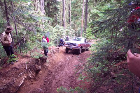 1989 Ford F-150 - Tough Hill on Naches Trail (Kaner Flats - WA). Notice the root ball stiking out of the bank (bottom left).