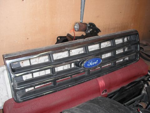 1991 Ford Bronco - A Ford grille with a blue oval emblem is shown, likely from a truck of the late 1980s.