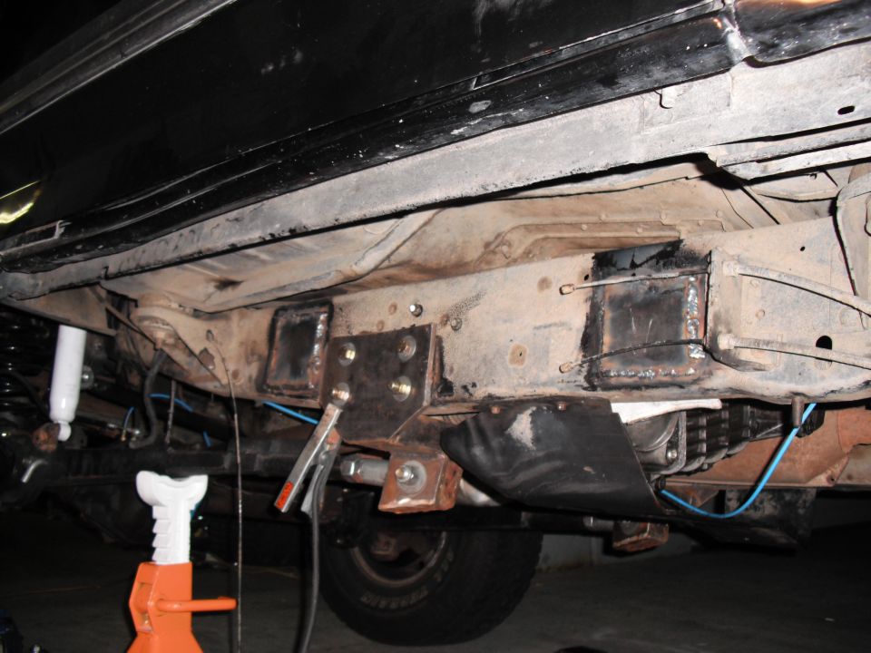 Welding frame sliders onto a vehicle's undercarriage