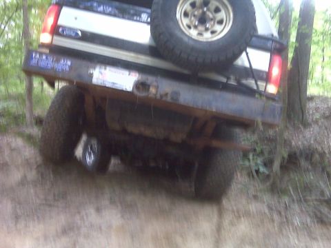 1983 Ford Bronco - At the bottom of the ravine, I had to make a tight turn to avoid the creek bed, which is another ~6' drop.