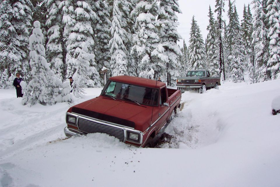 Jim backed into 'another' ditch, why does this not surprise me, and I had to pull him out, again.  

But this time I have the tires for it.  (day after Thanksgiving, 11/23/01)