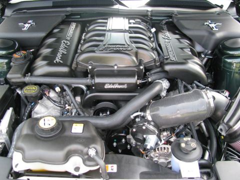 2003 Mercury Marauder - This image shows a supercharged V8 engine with Edelbrock components and Ford Mustang emblems.