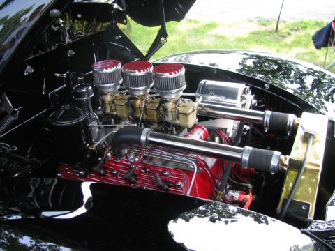 2003 Mercury Marauder - Custom hot rod engine triple carburetors and polished components.