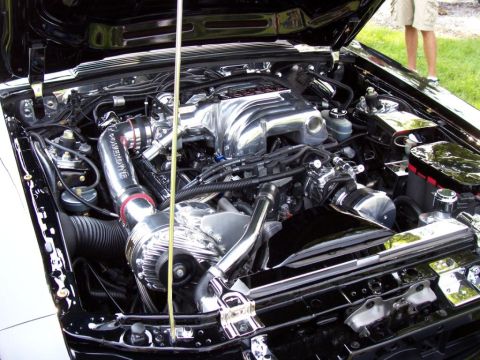 2003 Mercury Marauder - Custom engine bay features a polished supercharger and intake system.