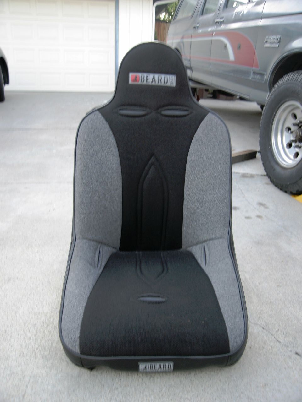 Black and gray racing seat with BEARD logo