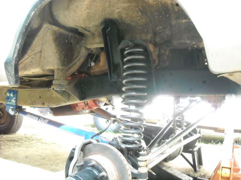 1979 Ford F-150 - Close-up of the front suspension and axle assembly of a 1979 Ford F-150.