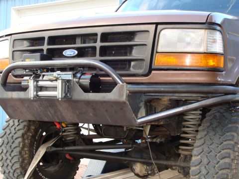 1993 Ford Bronco - The grille design and headlight shape suggest a 1992-1996 Ford Bronco, not a 1993 model.