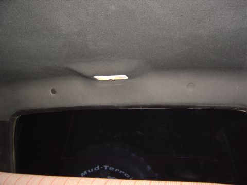 1986 Ford Bronco - Drilled holes in the inner top and installed trim push tabs. Note the light is on and is now wired int the Bronco with a disconect for when…