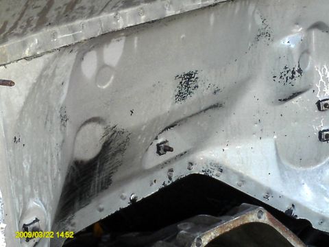 1992 Ford Bronco - Inner fender well detail, showing signs of age and use.