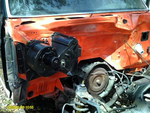 1992 Ford Bronco - Vehicle engine bay disassembled, showing firewall, blower motor, and transmission components.