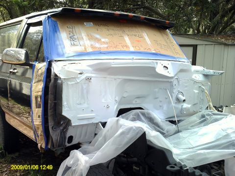 1992 Ford Bronco - 1992 Ford Bronco undergoing bodywork with engine bay prepped for paint.
